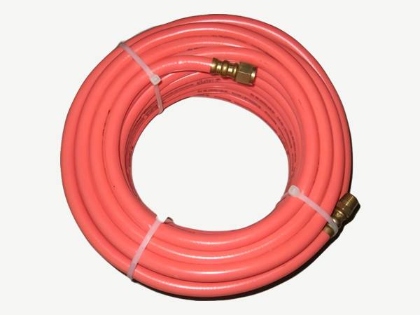 There is a roll of PVC air compressed hose assembly with brass coupling.